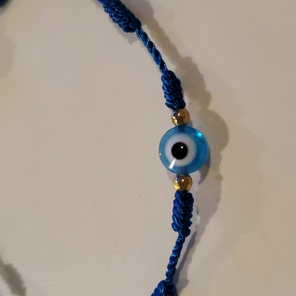 Evil eye bracelet with blue string - Picture 2 of 2